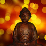 Image of a buddha sitting in meditation