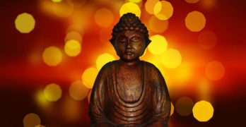 Image of a buddha sitting in meditation