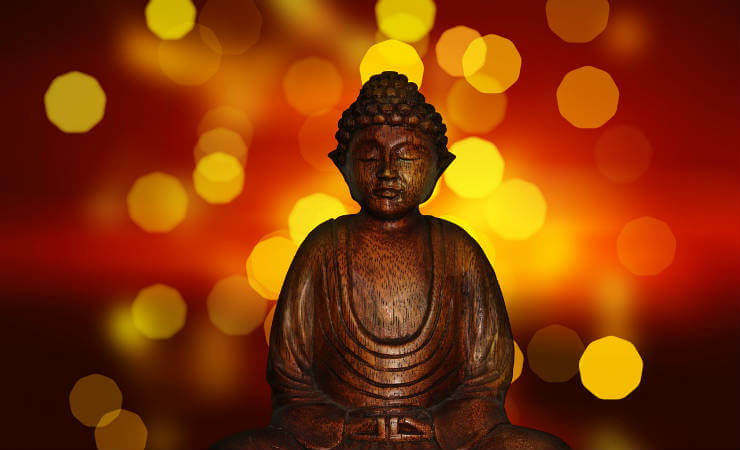 Image of a buddha sitting in meditation